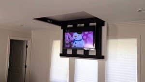 tv mounted from the ceiling 